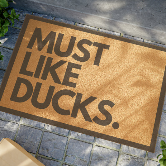 MUST LIKE DUCKS Doormat